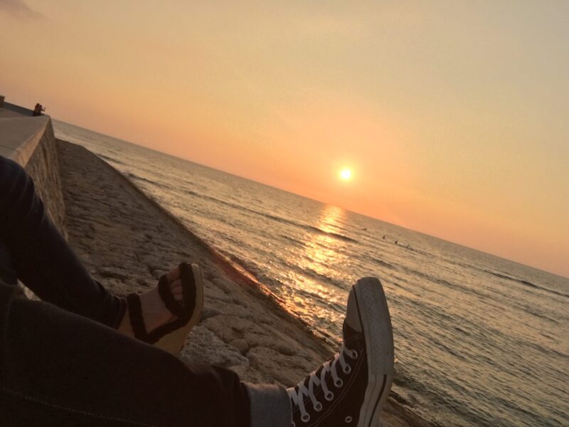 Sunset over the sea, seen from the top of the seawall