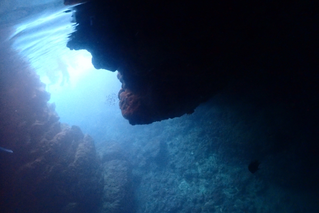 Sunlight coming through the mouth of the Blue Cave, seen from underwater
